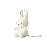The eco-friendly Miffy Keychain Corduroy 10cm in off-white features a metal ring and tag, with Miffy sitting upright.