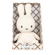 The Miffy Quilted Plush Gift Box - Cream 23cm is a charming, handcrafted toy that resembles a white rabbit with long ears. It comes beautifully packaged in an eco-friendly brown and white patterned box labeled "the bonbon miffy label," making it an ideal choice for those who value sustainability and charm.