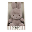 A 23cm Cozy Miffy plush toy comes nestled in a striped gift box. This taupe treasure from the Miffy brand is made from recycled polyester, promising both comfort and sustainability.