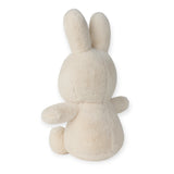 The Cozy Miffy Plush & Gift Box Cream - 23cm from Miffy, featuring its signature long ears and delicate cream-colored, ultra-soft fabric, rests invitingly against a plain background.