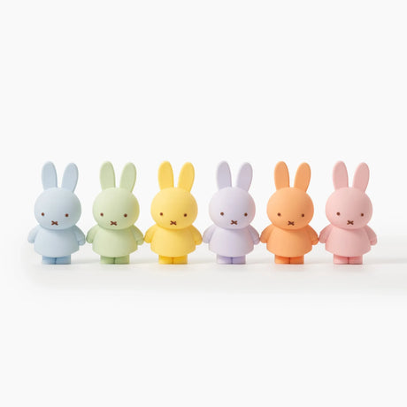 Smoko x Miffy Goes Pastel - Blind Box showing six pastel-colored Miffy bunny figures in soft blue, green, yellow, lavender, orange, and pink by Miffy.