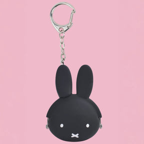 Black rabbit-shaped coin pouch keychain with silver keyring and chain, face detail