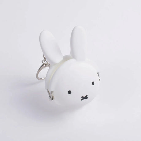 A white, bunny-shaped coin purse featuring ears and a metal clasp, evocative of the Miffy brand's Baby Miffy Keychain Purse, set against a plain backdrop.