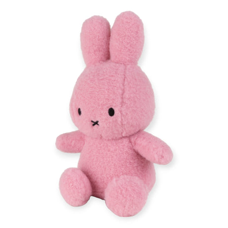 A Miffy Plush Cotton Candy - Rose 23cm, featuring a pink color with simple black eyes and a small black X-shaped mouth, sitting upright.