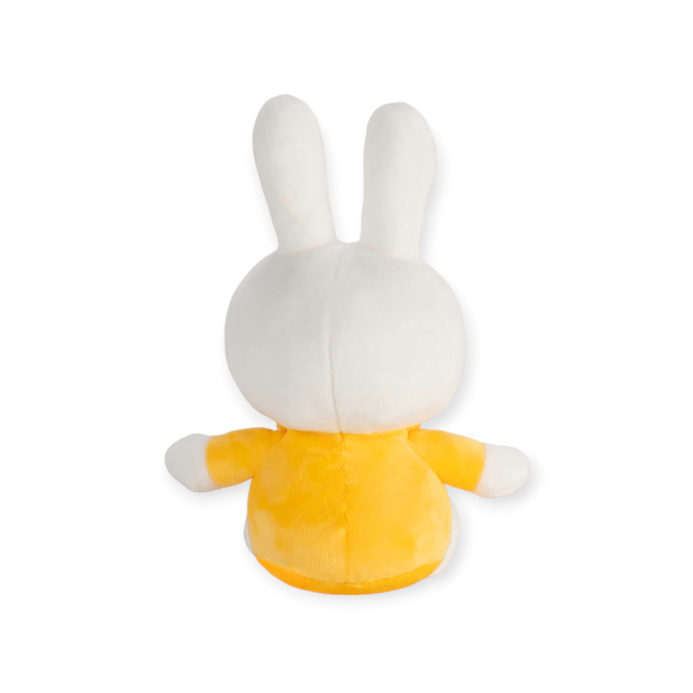 The Miffy Plush Classic Yellow - 20cm features a soft plush bunny with a white head and long ears, dressed in a yellow shirt, reminiscent of the beloved Miffy plush, shown from the back.