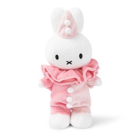 The Miffy Bunny Clown Plush - 24cm, from the Miffy brand, is an adorable plush white bunny wearing a pink clown outfit adorned with ruffles and playful pom-pom buttons, made from soft polyester fabric for ultimate snuggling.