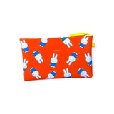 The Miffy Bunny Pattern Case 19cm, by Miffy, is a delightful orange silicone pouch adorned with a recurring design of Miffy Bunny in a blue outfit, and it includes a practical zipper for secure storage.