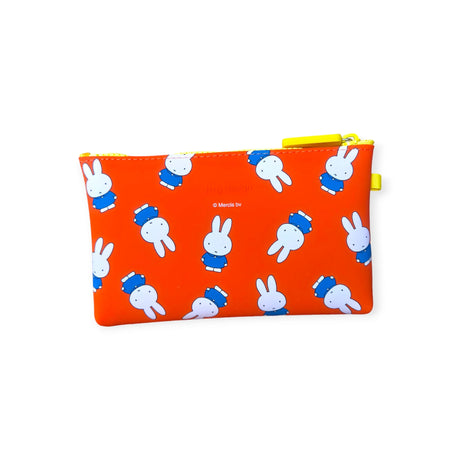 The Miffy Bunny Pattern Case 19cm, by Miffy, is a delightful orange silicone pouch adorned with a recurring design of Miffy Bunny in a blue outfit, and it includes a practical zipper for secure storage.