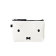 This sleek silicone pouch, inspired by Japanese design, showcases a minimalist black face adorned with two expressive eyes and a simple mouth. Similar to the Miffy Bunny Case White - 14cm by Miffy, it includes a stylish black zipper for secure storage.