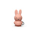 The Miffy Keychain - Powder by Miffy highlights a minimalist design with its small, pink rabbit shape, featuring a simple facial expression and a metal keyring. It's an ideal modern addition to any set of keys.