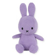 The Miffy Bunny Plush Corduroy - Lilac 23cm, presented by the brand Miffy, is an eco-friendly option featuring long ears, black eyes, and a small X-shaped nose in an upright sitting position. This adorable plush toy offers a hypoallergenic choice without losing its charming appeal.