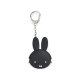 The Miffy Keychain Coin Pouch - Black is a delightful black keychain pouch resembling a rabbit's head with long ears and a simple face, made from soft Japanese silicone.