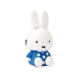 A Miffy Flower Dress Case Silicone, featuring the iconic white rabbit styled in a blue dress adorned with white flowers, is displayed against a white background.