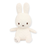 Introducing the Miffy Quilted Plush Gift Box in cream, a 23cm eco-conscious toy from the Miffy brand. This plush rabbit features quilted fabric, two long ears, simple facial features, and a small rabbit logo on one paw.