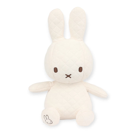 Introducing the Miffy Quilted Plush Gift Box in cream, a 23cm eco-conscious toy from the Miffy brand. This plush rabbit features quilted fabric, two long ears, simple facial features, and a small rabbit logo on one paw.