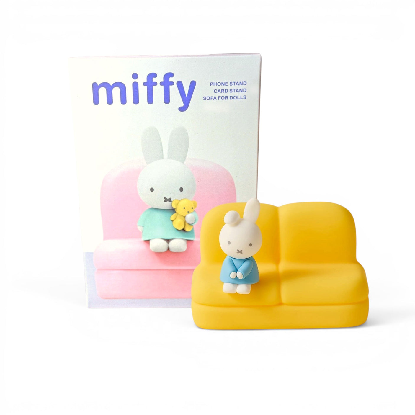 Phone stand sofa with Miffy rabbit figure on pink seat and yellow side sofa