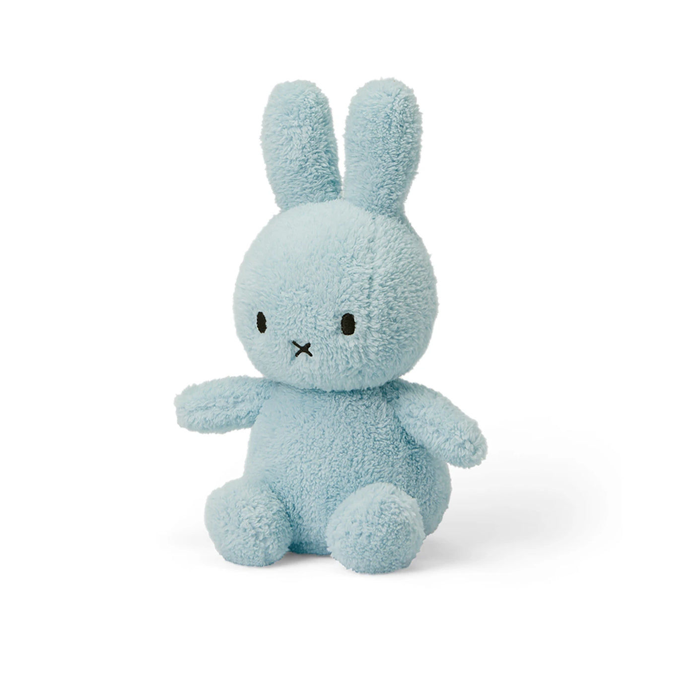 The Miffy Bunny Plush - Terry Light Blue from the Miffy brand is a small, 23cm tall rabbit toy made of soft terry fabric. It features black eyes and a simple stitched mouth, showcasing its classic appearance while sitting upright.