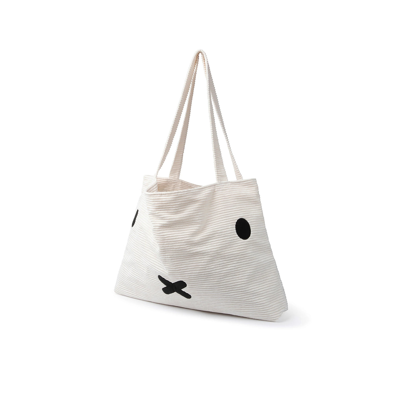 The Miffy Corduroy Shopper Bag by Miffy is an eco-friendly accessory crafted in white corduroy with long handles. It showcases a minimalist black face design featuring eyes and an "X" for a mouth, blending style and sustainability seamlessly.