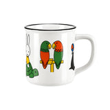 White ceramic mug with parrot and rabbit animal illustrations, side handle and black rim