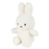 Introducing the Miffy Plush Cotton Candy in Cream, a 23cm toy designed to look like a rabbit, featuring minimalist details with black eyes and a small X-shaped mouth. Crafted by Miffy from ultra-soft fabric, it's perfect for maximum cuddles.