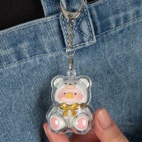 Clear mini teddy keychain case with pink pig face, gold bow, silver chain