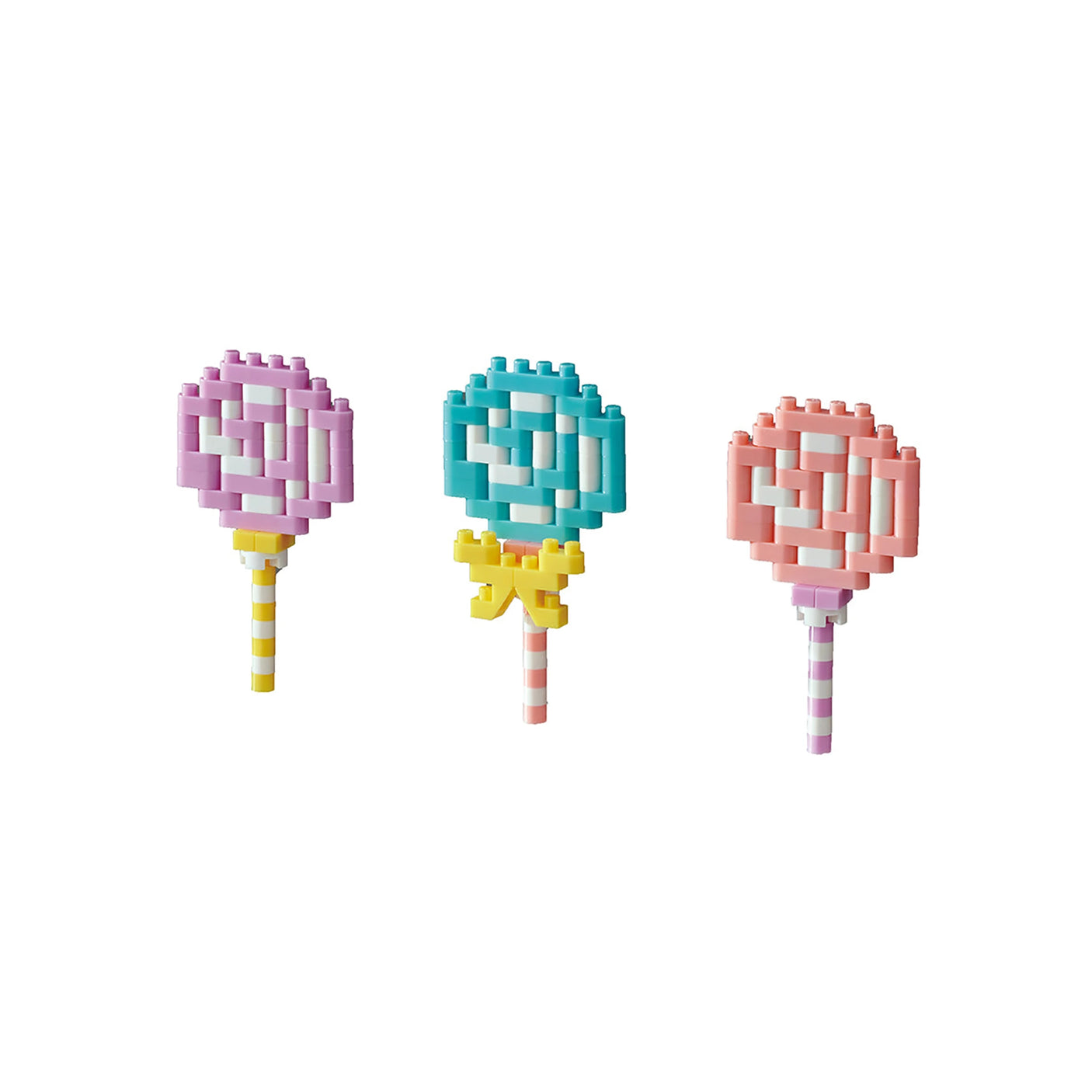 Three pastel-colored Nanoblock Lollipop shapes from the Food Series are displayed on a white background, showcasing stunning miniature building artistry.