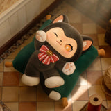 Moffy's Tailoring Shop - Magic Furry Mewky Blind Box plush with a wink, striped bow, lying on a green pillow by Mewky