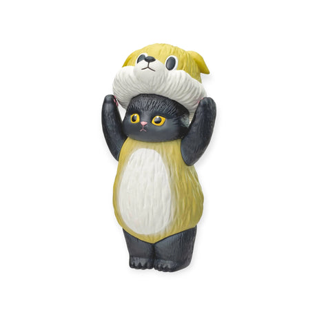 A Mofusand Premium - 8cm Adjustable Cat Blind Box showcasing a cat in a yellow dog costume, with its arms raised in playful curiosity.