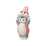 This Mofusand Premium - 8cm Adjustable Cat Blind Box showcases a delightful cat figurine dressed in an adorable pink and white rabbit costume. Ideal for collectors or as an exciting addition to any blind box collection, it encapsulates the whimsical charm of feline fashion.