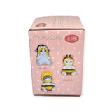 Uncover the charm of the Mofusand Mini Figure Blind Box - Vol 3 (Pink) featuring delightful cat figurines dressed up as a penguin, tiger, and bee set against a whimsical pink polka dot backdrop. Each blind box reveals an enchanting mini wonderland with these adorable figures by Mofusand!