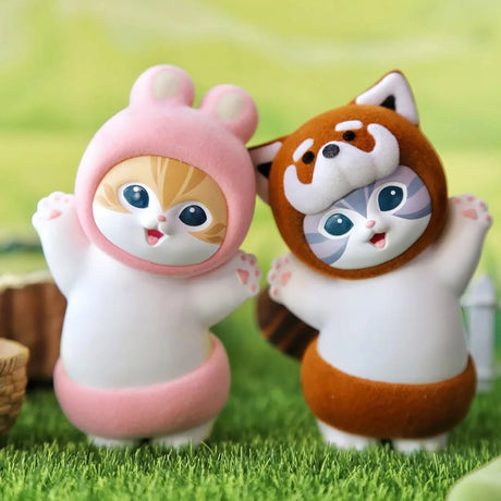 Two plush animal blind box figures: pink and orange with cat faces and blue eyes