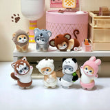 Assorted plush animal blind box figures on shelves: gray, white, brown, and pink