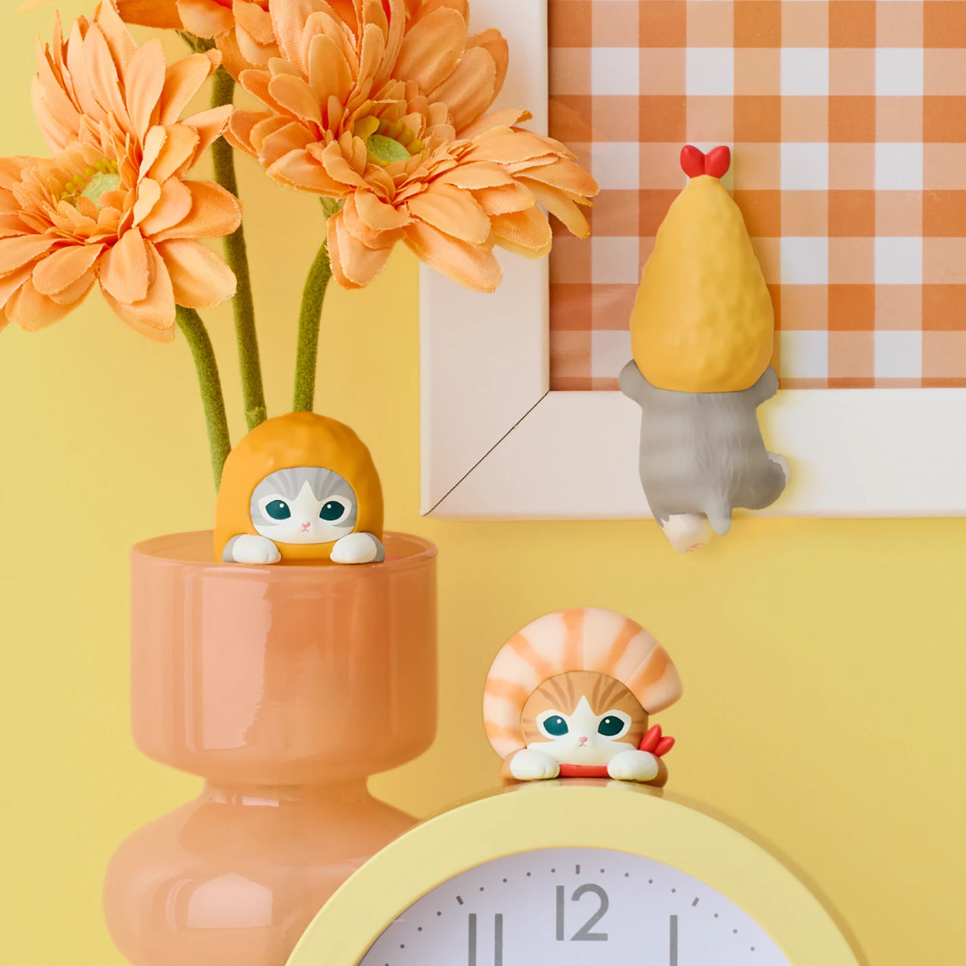 Two Hippers shrimp characters sitting in a white container on a tabletop