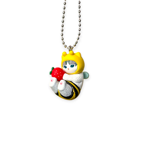 Bumblebee character keychain holding a strawberry