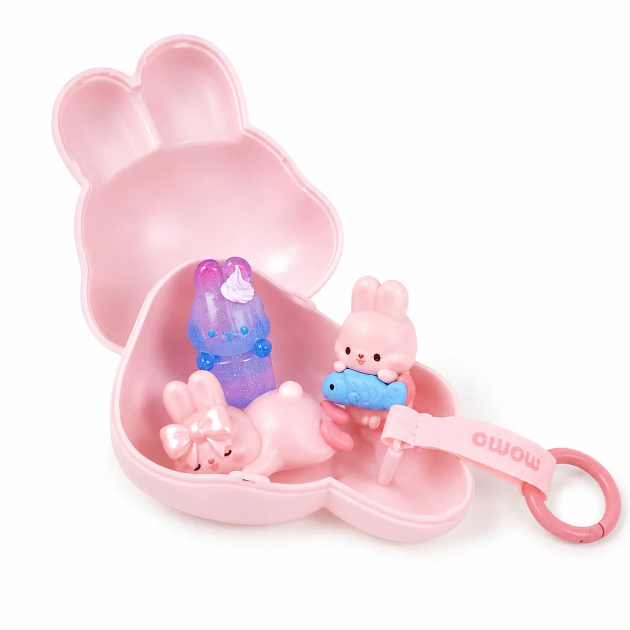 Open pink bunny carrying case with purple and blue figures and small bow accessory