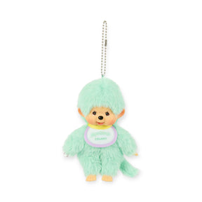 The Monchhichi Colours Bag Charm - Mint Green by Monchhichi features a plush monkey doll with a round head, embroidered face, and "Monchhichi COLORS" bib—perfect as a cute bag charm or thoughtful keychain gift on a silver ball chain.