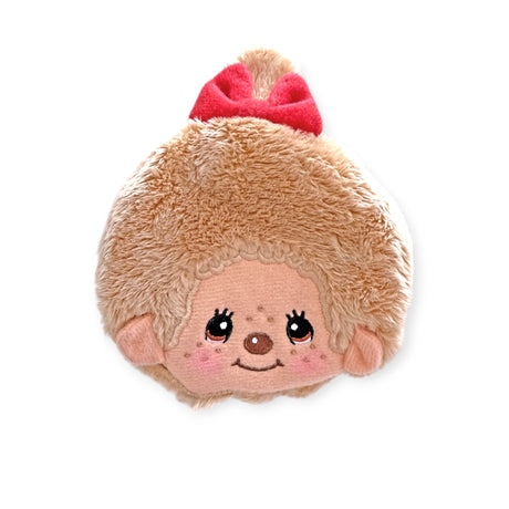 Introducing the Monchhichi Coin Pouch - BebeChichi, a plush toy with a round face, smiling expression, and tiny freckles. Crafted from soft plush fabric, it has a charming red bow and brown fuzzy texture that feels as cozy as hugging your favorite item from the Monchhichi brand.