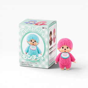 Monchhichi flocked figure in pink with hood, standing beside blind box