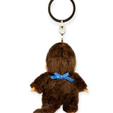 Brown plush Monchhichi keychain from gold clasp and round keyring, rear view