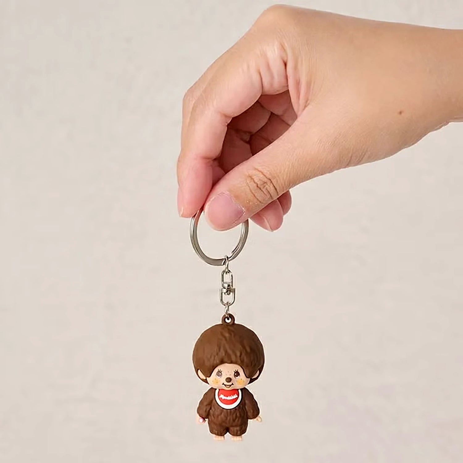 Monchhichi mini figure keychain boy, brown plush mini figure held on metal key ring
