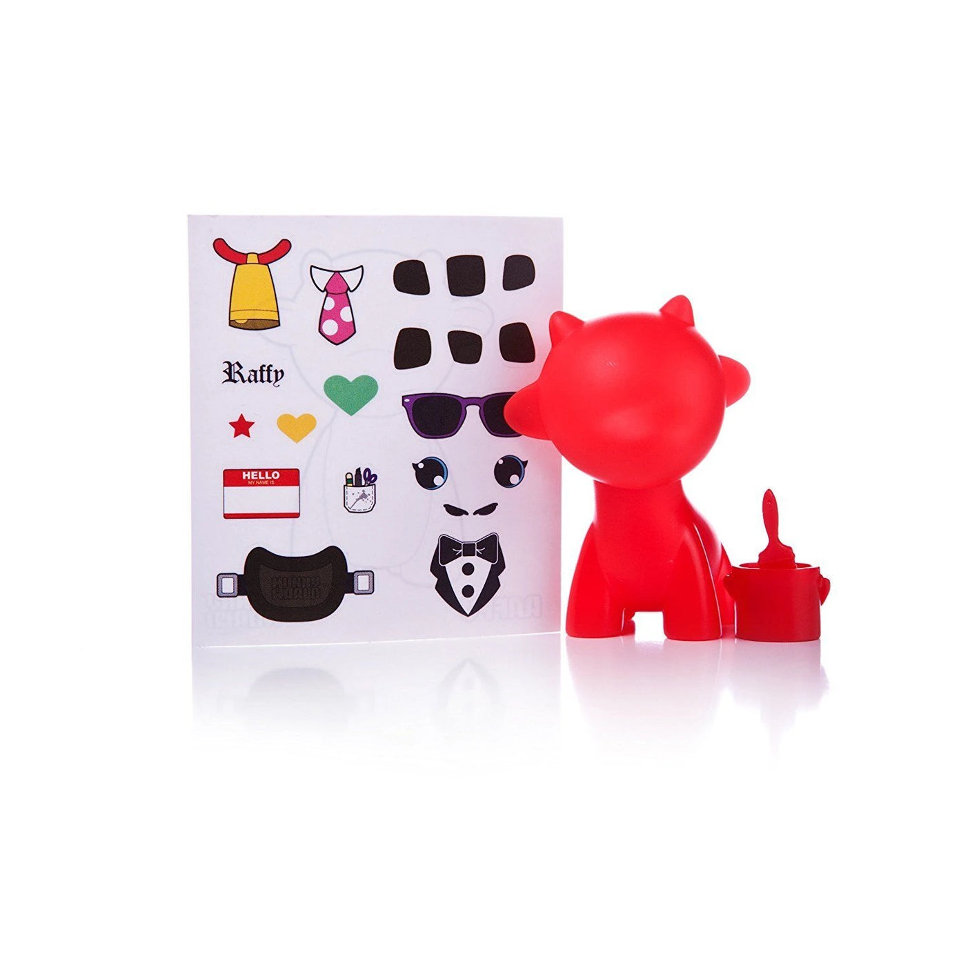 A red toy figure from the Munnyworld - DIY Personalised Pop Vinyl mini figure collection by Kidrobot features a detachable head and comes with stickers such as sunglasses, a bow tie, and hearts for endless DIY customization.