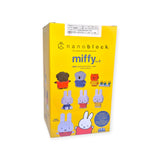 The image showcases a yellow Nanoblock box labeled "Nanoblock Miffy Blind Bag - Vol. 3," featuring Miffy figures constructed from blocks. A cartoon Miffy adorns the bottom, evoking a sense of surprise similar to finding a treasure in a blind bag.