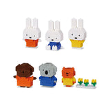 This enchanting Nanoblock Miffy Blind Bag - Vol. 3 set from Nanoblock includes six toy block figures, featuring three adorable white rabbits, a bear, a koala, and an orange character. These charming Miffy figures come with a small block of three yellow flowers, bringing whimsical fun to any collection.