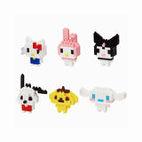 Displayed against a plain background are six small, colorful figures crafted from interlocking pieces, featuring animal and character designs from the Nanoblock Sanrio Blind Bag collection by Nanoblock.