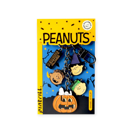 Peanuts Halloween keychain set with characters Lucy, Franklin, Linus in costumes and Snoopy on pumpkin charm