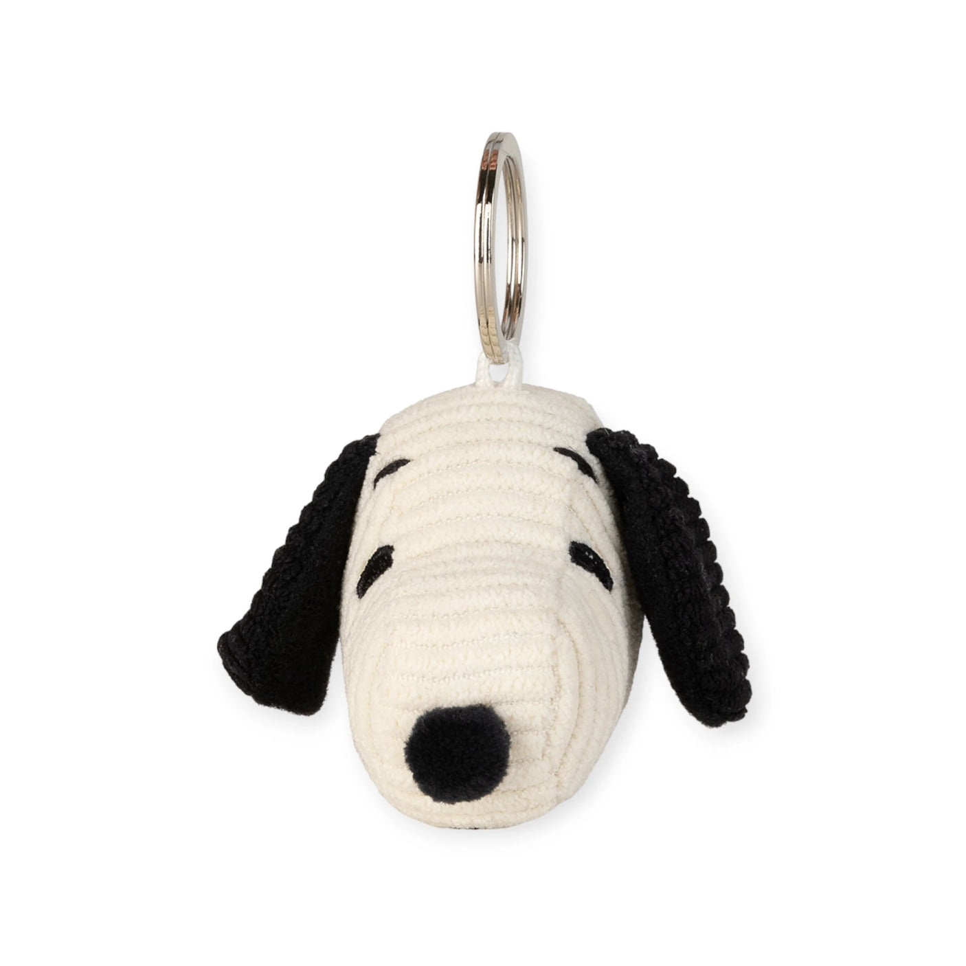 The Snoopy Head Keychain 4.5cm - Corduroy Cream by Snoopy showcases a plush dog head with black ears, a black nose, and closed eyes. Drawing inspiration from Peanuts adventures, this adorable accessory embodies the playful spirit of the cherished character.