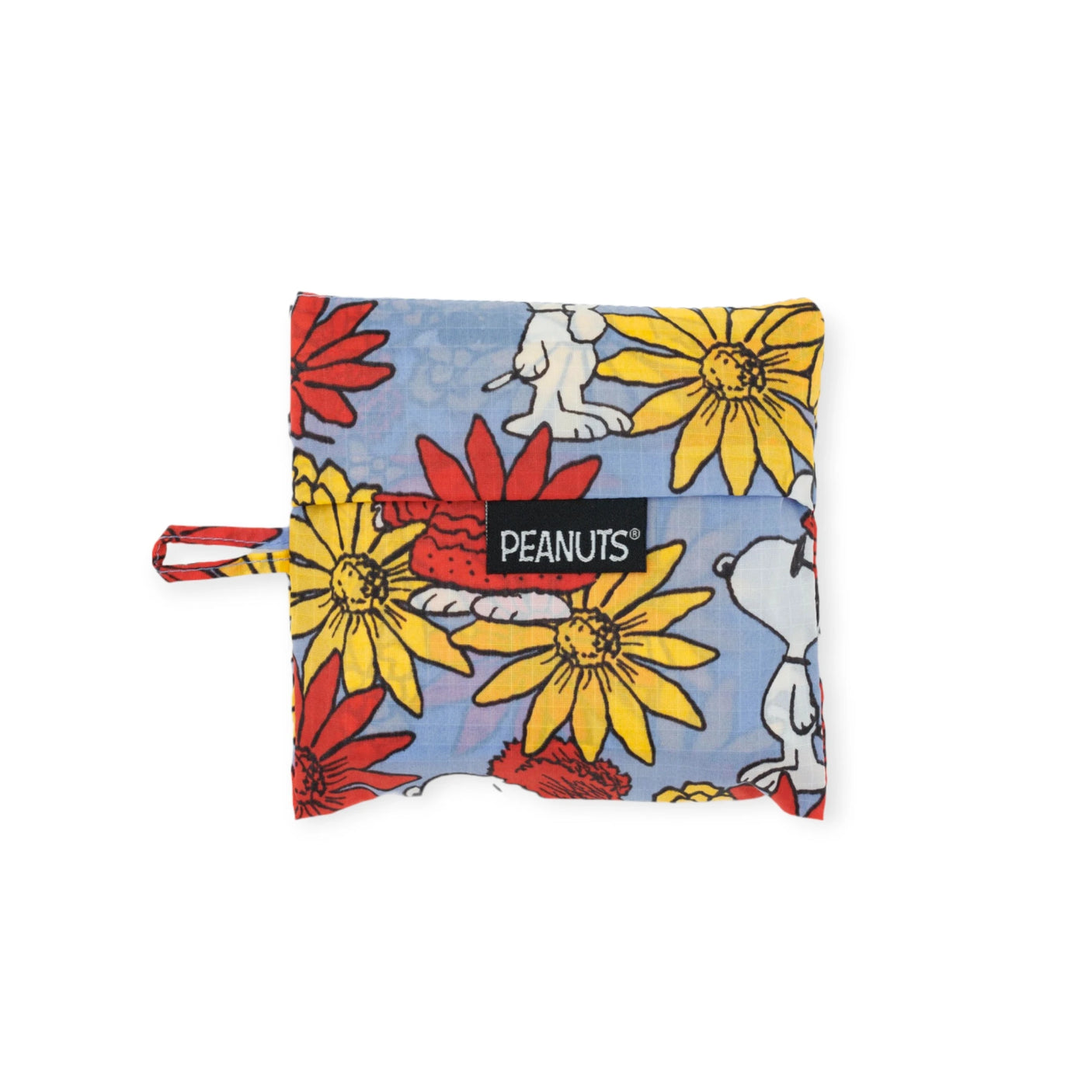 The Baggu Standard - Peanuts Floral Snoopy is a square pouch made from recycled nylon, showcasing a vibrant design of red and yellow flowers on a blue background, complete with delightful images of Snoopy. It features the Peanuts label and functions as a practical reusable bag from Baggu.