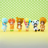 Group of small blind box character dolls with animal hoods and bright outfits