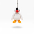 Plush penguin keychain with silver chain, white body, black cap, red beak, orange feet