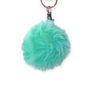 Fluffy turquoise pom pom bag charm with silver lobster claw clip for easy attachment to bags or keys
